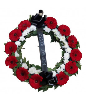 Red and white funeral flower wreath